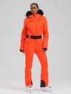 Gsou Damen-Skioverall „Snow Mountain Chic“ mit Kunstpelzbesatz und ausgestelltem Bein